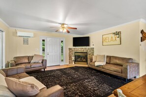 Smart TV, fireplace, books