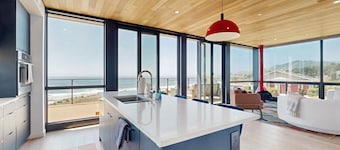 Modern oceanfront container  home with electric fireplace & wifi - walk to beach