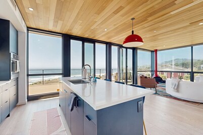 Modern oceanfront container  home with electric fireplace & wifi - walk to beach