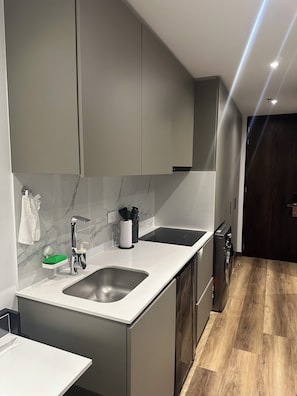 Fridge, microwave, stovetop, coffee/tea maker