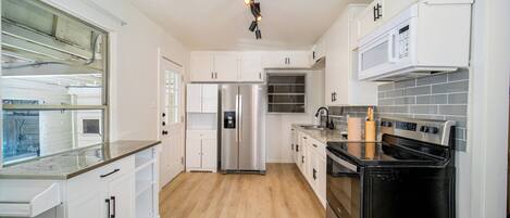 Dishwasher, coffee/tea maker, cookware/dishes/utensils