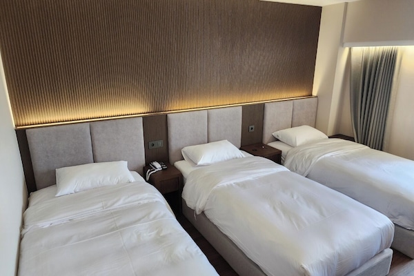 Quarto triplo luxo | Roupas de cama premium, edredons de pluma