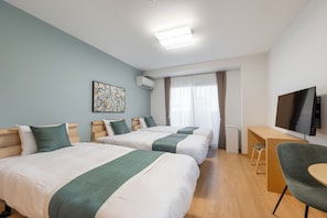Habitación triple estándar | Wifi gratis y ropa de cama 