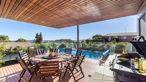 The Family Tide – large family home, entertaining deck with views, swimming pool, air conditioning