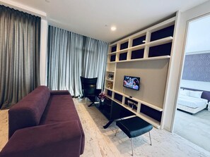 Superior Apartment, Non Smoking, City View | Living area | TV