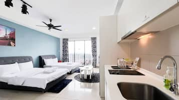 Deluxe Studio Suite, City View | Iron/ironing board, free WiFi