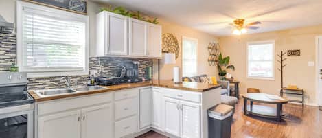 Fridge, microwave, stovetop, coffee/tea maker