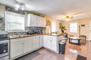 Fridge, microwave, stovetop, coffee/tea maker
