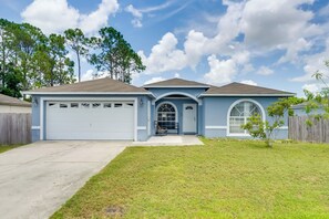 Exterior - Fenced Yard & Game Room: Family Home in Kissimmee! (Kissimmee)