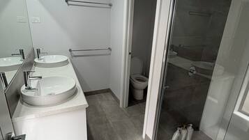 Shower, towels, soap, toilet paper