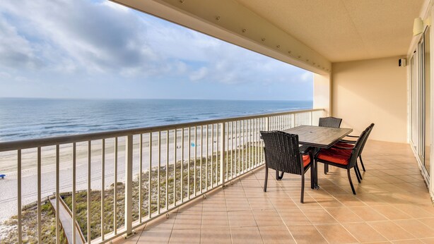 A balcony with a view of the beach and ocean. - Navarre Condo w/ Beach Access & Ocean Views! (Navarre)