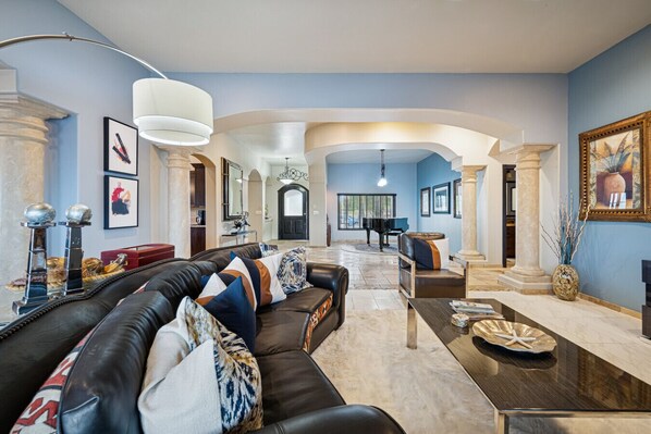 TV, fireplace, books