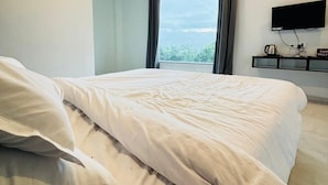 ห้องดีลักซ์ | โต๊ะทำงาน, เตียงเสริม/เปล, Wi-Fi ฟรี, ผ้าปูที่นอน