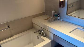 Shower, hair dryer, towels, toilet paper