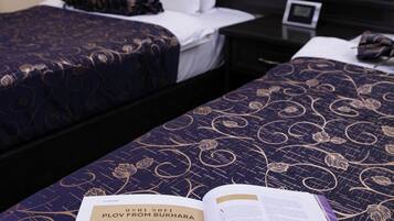 Premium bedding, down duvets, in-room safe, desk