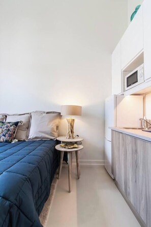 Planxa i posts de planxar, wifi i roba de llit 