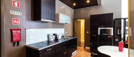 Fridge, microwave, stovetop, coffee/tea maker