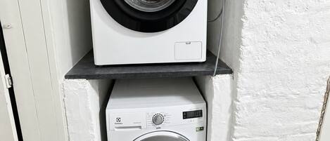 More washing machines in the basement laundry