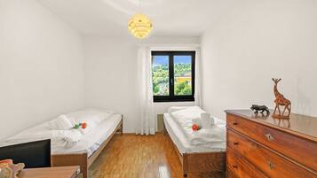 Family House, Multiple Bedrooms (Casa Ana 2 - Losone Center) | 2 bedrooms, iron/ironing board, bed sheets