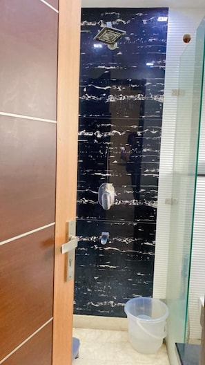 Deluxe Room, City View | Bathroom | Shower, designer toiletries, hair dryer, bathrobes