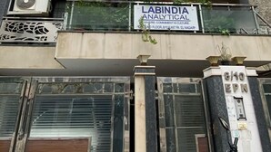 A multi-story building with a sign for 'Labindia Analytical' on the ground floor. - Cassava Stay (New Delhi)