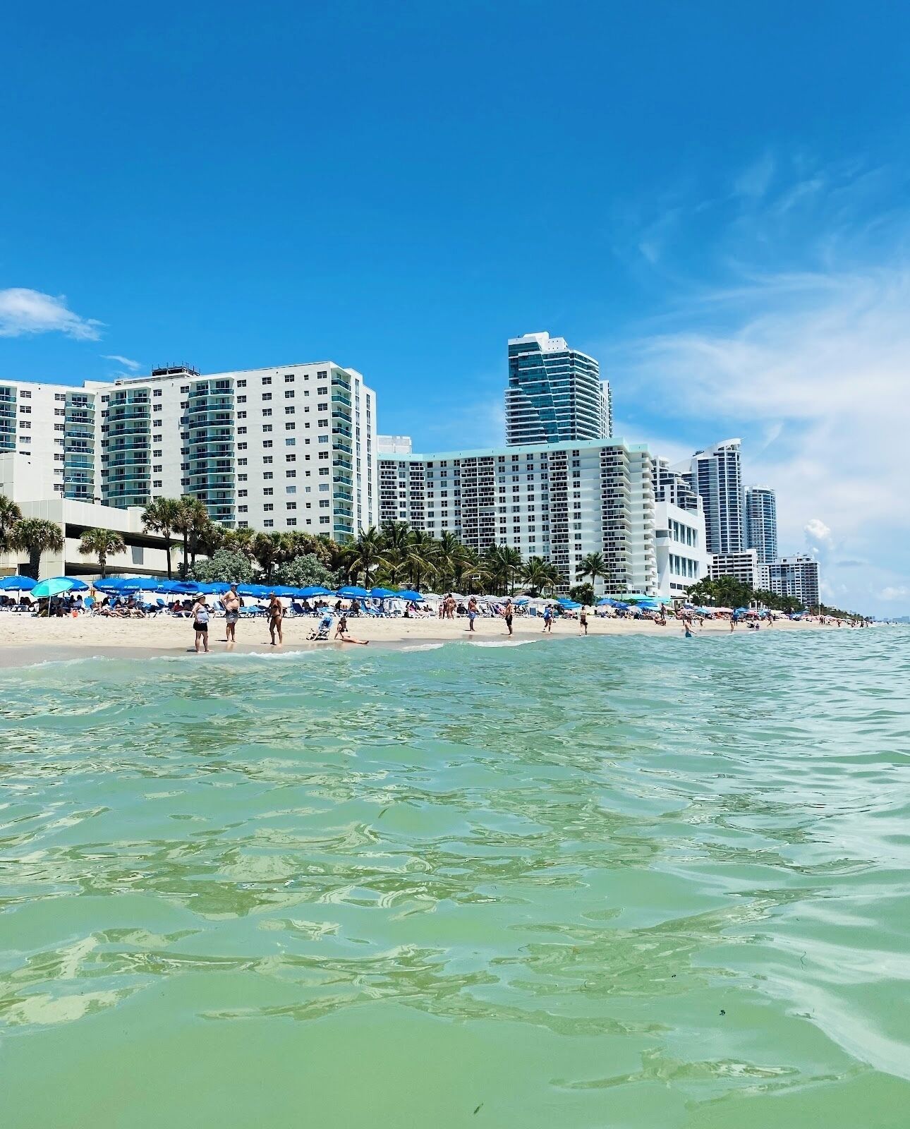 On the beach, sun loungers, beach towels
