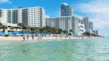 On the beach, sun-loungers, beach towels