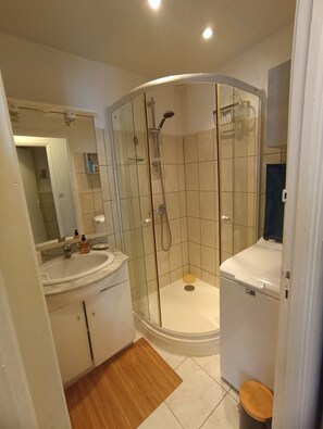 Shower, hair dryer, soap, shampoo
