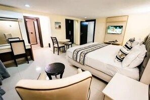 Economy Apartment, Balcony, City View | Desk, laptop workspace, blackout drapes, soundproofing