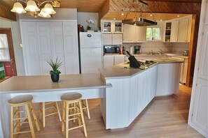 Cottage, 3 Bedrooms | Private kitchen | Fridge, coffee/tea maker, toaster