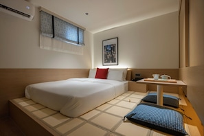 Een gratis minibar, een laptopwerkplek, gratis wifi, beddengoed