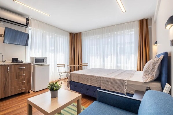 1 habitación, tabla de planchar con plancha, wifi gratis y ropa de cama 