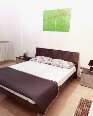 2 habitaciones, tabla de planchar con plancha, wifi y ropa de cama 