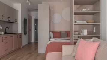 A modern bedroom with a bed, bedside tables, and a built-in wardrobe.