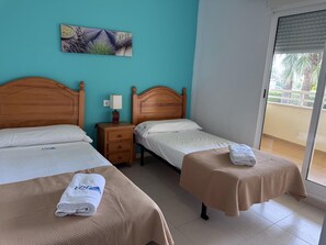 3 bedrooms, WiFi (free), bed sheets - Seafront apartment with pool and parking in Denia - Sleeps 8 (Denia)