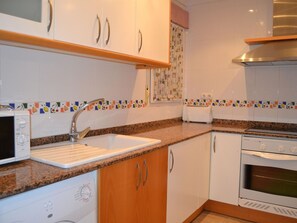 Fridge, microwave, coffee/tea maker, toaster