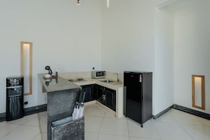 Fridge, microwave, stovetop, coffee/tea maker