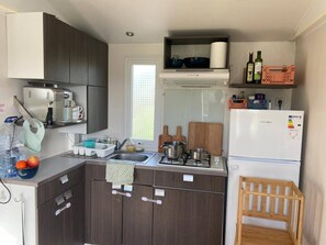 Asuntovaunu, 2 makuuhuonetta, parveke, näköala puutarhaan | Sisätilat