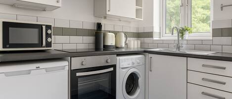 Refrigerador, microondas, horno, placa de cocina