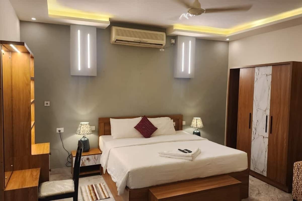 Deluxe kamer, 1 twee- of 2 eenpersoonsbedden | Een strijkplank/strijkijzer, gratis wifi