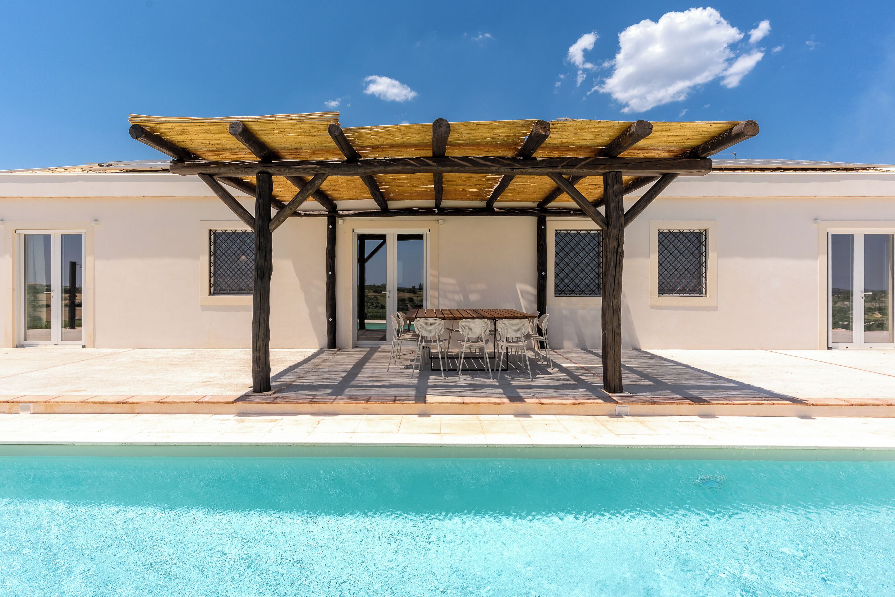 Seasonal outdoor pool, pool loungers