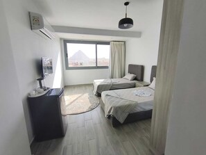 Habitación Confort con 1 cama doble o 2 individuales | Escritorio, wifi gratis, ropa de cama