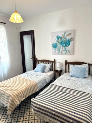 3 dormitorios, tabla de planchar con plancha, wifi y ropa de cama