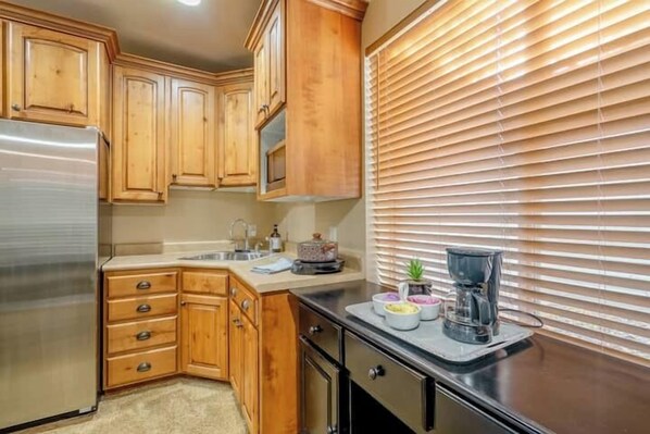 Fridge, microwave, coffee/tea maker, toaster