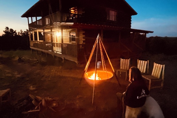 Enjoying a campfire at the cabin