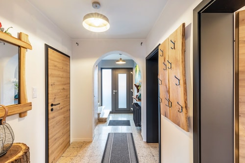 Ferienhaus 'Liebe' mit Gemeinschaftsgarten, Balkon und WLAN