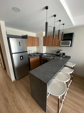 Fridge, microwave, coffee/tea maker