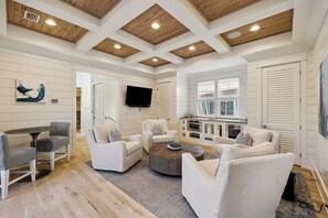 Smart TV, fireplace, books, offices