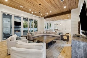 Smart TV, fireplace, books, offices