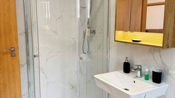 Hair dryer, towels, soap, toilet paper